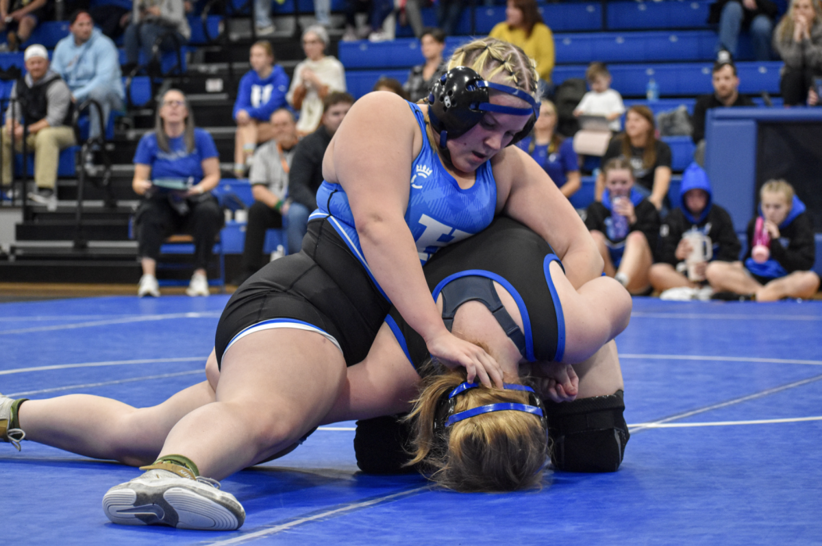 Abigail Berling (10) takes down an opponent from Simon Kenton.